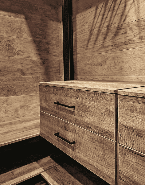 Деталь гардеробной системы — комод с выдвижными ящиками и металлическими ручками